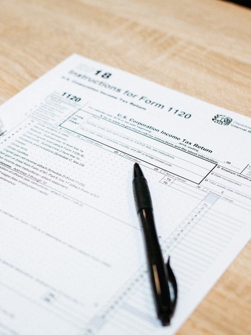 black click pen on white paper